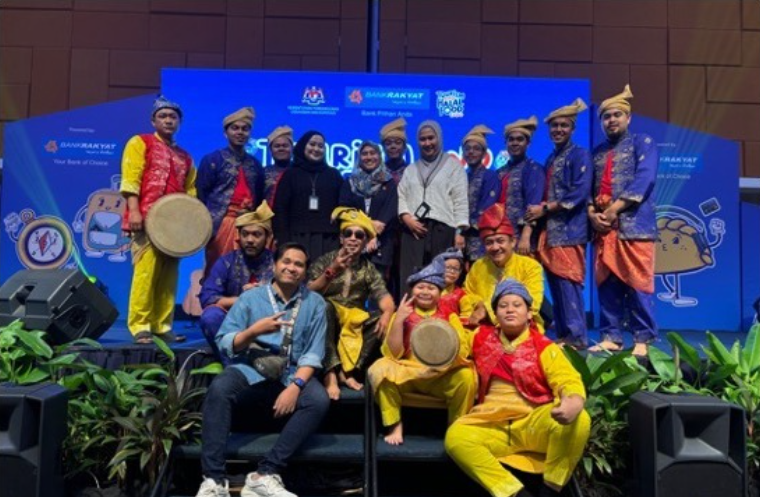 Tourism & Halal Food Expo 2024 — cultural performers and team photo